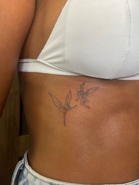 Outline Tattoo Aesthetic, Rib Fairy Tattoo, Fairy Tattoo Side Rib, Fairy Tattoo Ribs, Small Side Rib Tattoo, Fairy Rib Tattoo, Fineline Fairy Tattoo, Tattoos On Side Ribs For Women, Fairy Tattoo Ideas For Women