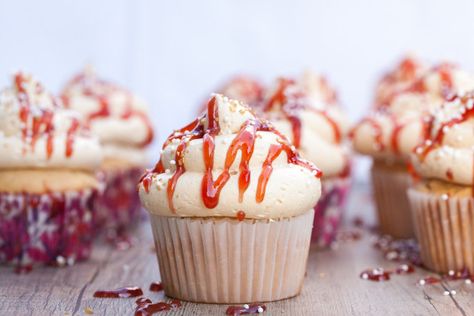 PB&J cupcakes turn your favorite sandwich into your favorite dessert. The frosting is to die for! Pbj Cupcakes, Cupcakes Filled, Cupcake Queen, Butter Cupcakes, Cupcake Images, Strawberry Preserves, Cupcake Bakery, Delectable Desserts, Secret Pocket