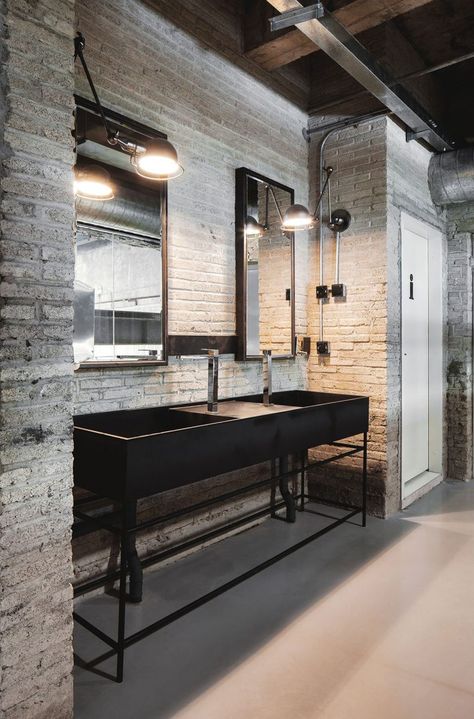 Industrial Office Features Exposed Bricks & Concrete Ceilings<span class="wtr-time-wrap after-title"><span class="wtr-time-number">2</span> min read</span> Vintage Industrial Bathroom, Industrial Bathroom Decor, Brick Bathroom, Industrial Bathroom Design, Urban Industrial Decor, Industrial Chic Decor, Industrial Style Interior, Dining Room Industrial, Modern Industrial Decor