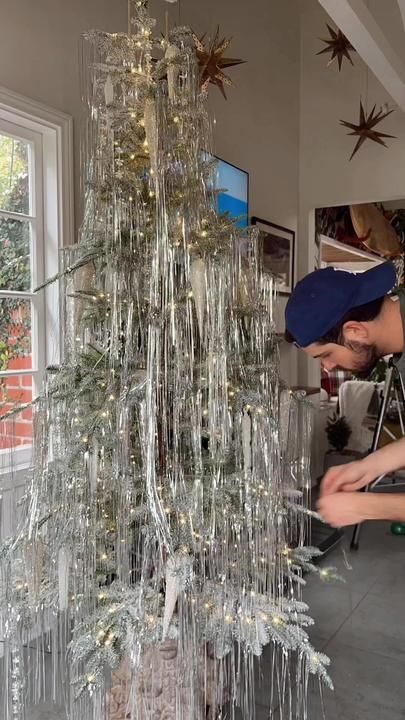 Pop Up Tinsel Tree, Tensile Christmas Tree, Christmas Tree With Tensil, Tensil Trees, Tinsel Covered Christmas Tree, Adding Tinsel To Christmas Tree, Tinsel Centerpieces, How To Add Tinsel To Christmas Tree, Icicles On Christmas Tree