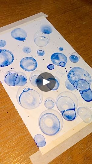 5.7K views · 161 reactions | My favorite thing about art is that there are no rules 🫧🧼🛁 
Steps to painting with bubbles:
Mix desired watercolor shade with liquid soap and a bit of water. The consistency should be more viscous than just watercolor itself but not so thick that a paintbrush does not easily move the liquid around. Next, use a straw (metal or glass because plastic is shit) and dip the tip in. Practice blowing bubbles on your pallets first which will help you gauge your breath. If you want clean bubbles with no splatter, put a drop of water on the paper and then blow a bubble onto the drop. If you don’t care about them popping and creating a splatter texture then blow the bubble straight onto the paper. Some will pop and some wont. Experiment with the ratio of soap to water t How To Paint Bubbles, Watercolor Bubbles Painting, Painting With Bubbles, Bubble Video, Bubble Drawing, A Drop Of Water, There Are No Rules, Bubble Painting, Drop Of Water