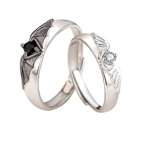 PRICES MAY VARY. DESIGN -- This gothic couples rings is designed by angel and devil wings. The opening of the ring is adjustable. The white symbolizes the angel and the black symbolizes the devil. ADJUSTABLE SIZE --- Devil and angel couple rings has an adjustable function, Fairly easy to resize,Very flexible, easy to put on or take off, suitable for most people to wear. MATERIAL --- Copper+zircon. Angel and devil rings are made of high-quality copper material. The copper material is easy to adju Cool Promise Rings, Masc Ring, Matching Rings Aesthetic, Promise Rings For Her Girlfriends, Gothic Wedding Bands, Boyfriend Promise Ring, Matching Rings For Couples, Dragon Goddess, Angel Couple