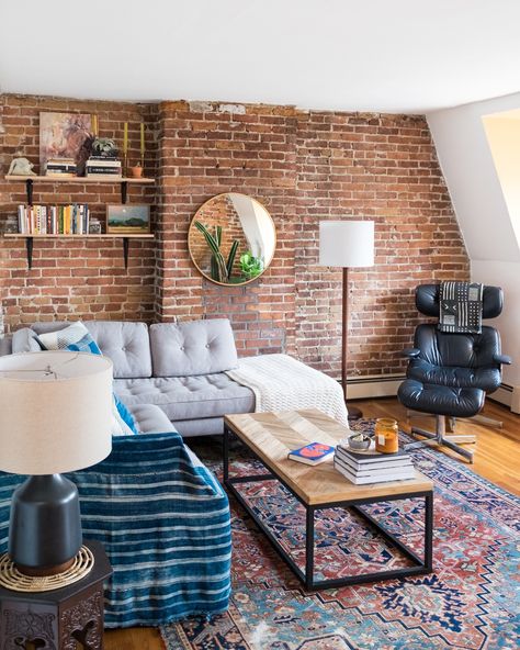 As a writer and photographer for Apartment Therapy, Emily Billings knows that readers look to House Tours for inspiration. She was kind enough to provide a glimpse into her Boston apartment—where she lives with her partner Max— and also provides links to most of the items in her beautiful home. Check them out below. Brick Wall Living Room, Brick Living Room, Boston Apartment, Apartment Style, Walls Room, Office Set, Affordable Furniture, Exposed Brick, Dream Decor