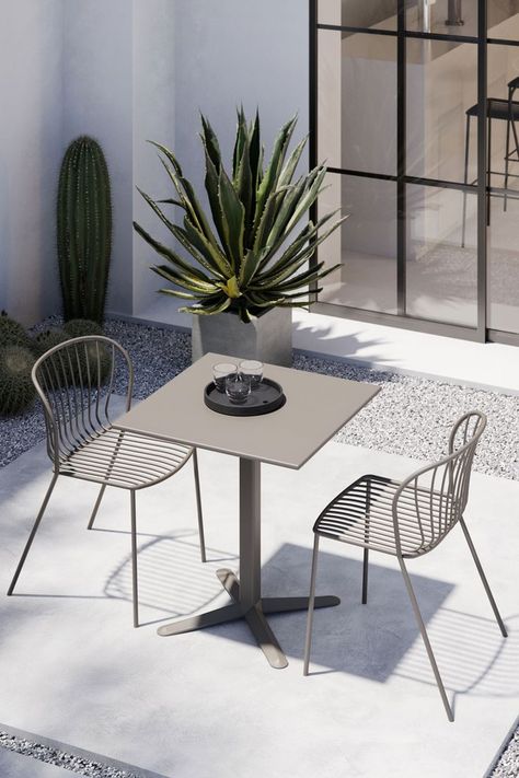 The Amitha collection, designed by Forsix, is a family of metal outdoor chairs with classically elegant lines. This steel tube stacking chair with generously welcoming curves is extremely comfortable. Its timeless design makes it suitable for use in the most refined of contract and hospitality installations. The frame is treated for outdoor use and has a matt lacquer finish. #outdoorfurniture #metalchair #outdoordining #chairdesign #chair #furniture #furnituredesign #hospitalityfurniture Coffee Shop Tables, Metal Outdoor Table, Kursi Outdoor, Metal Outdoor Chairs, Sunroom Furniture, Metal Outdoor Furniture, Cafe Furniture, Coaster Furniture, Hotel Furniture