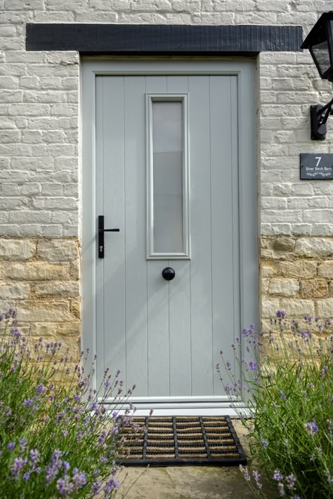 Swipe for interior - The Flint 4 design in Painswick from Solidor's Flint Cottage Range with a single glass panel and Black door hardware. Composite Back Door Ideas, Front Door Stone House, Painswick Front Door, Modern Red Brick House Exterior, Solidor Painswick, Modern Red Brick House, Modern Traditional Front Door, Pub Renovation, Composite Front Doors Uk