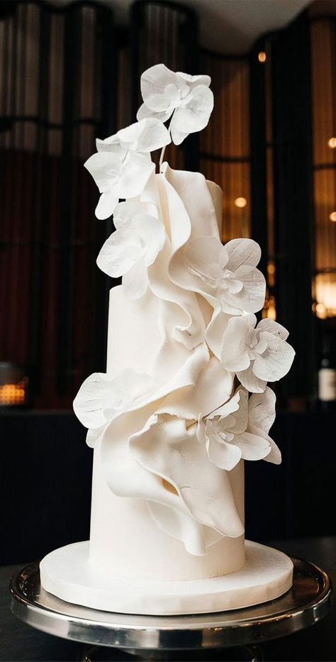 Wedding Cakes Orchids, Unique White Wedding Cakes, Avant Garde Wedding Cake, Sculptural Wedding Cake, Orchid Decoration Wedding, White Orchid Wedding Cake, Draped Wedding Cake, Modern Wedding Style, Abstract Wedding Cake