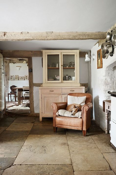 [i]Harriet ripped up the existing carpet tiles to expose the York stone flooring in the kitchen.[/i]  Like this? Then you'll love  [link url="http://www.houseandgarden.co.uk/interiors/staircases"]Staircase ideas[/link] Vaisseliers Vintage, Scottish Cottages, York Stone, Kitchen Seating, Casa Country, Country Cottage Decor, Reading Nooks, Cottage Interiors, English Cottage