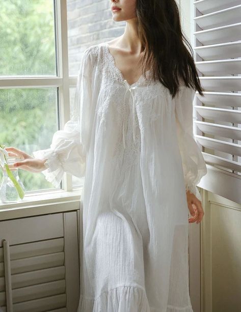 Are you looking for a high-quality, beautiful piece of sleepwear? Look no further than the Women Fairy Pure Cotton Puff Sleeve Robe Double Layers Long Night Dress. Don't miss out on our amazing collection of nightgowns! Not only are they comfortable and stylish, but they make a perfect gift for your special someone. Get yours today and enjoy the best sleep ever! #nightgowns #bedtimecomfort. Material: Pure Cotton Decoration: Lace Sleeve Length: Long Sleeve Parcel Include: 1PC Nightgown Blue And White Palette, Vintage Princess Dress, Victorian Nightgown, Vestidos Retro, White Palette, Edwardian Dress, Lace Nightgown, Vintage Nightgown, Blue Night