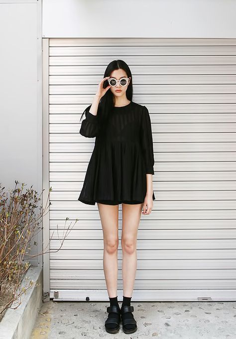 Shop this look on Lookastic:  https://lookastic.com/women/looks/casual-dress-shorts-flat-sandals-socks-sunglasses/2967  — Black Pleated Casual Dress  — Black Socks  — Black Shorts  — Black and White Sunglasses  — Black Leather Flat Sandals Little Black Dress Outfit, Look Festival, Woman In Black, Hippy Chic, Black Dress Outfits, Short Dresses Casual, Black Women Fashion, Inspired Outfits, Minimal Fashion