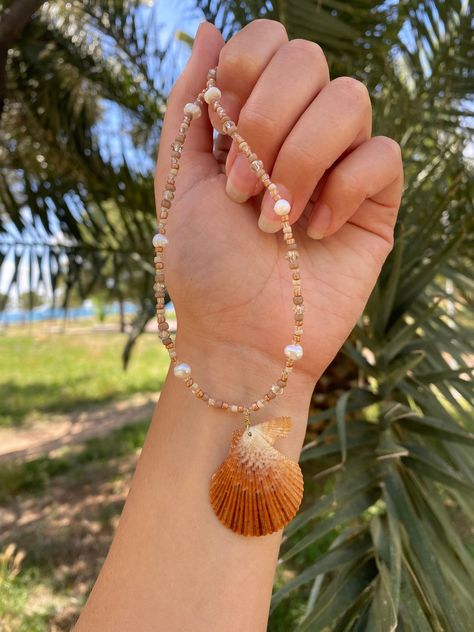 Handmade seashell necklace 🐚 The necklace is made from an ethically handpicked seashell from local beaches in Greece. 🌊🐚 Made with stainless steel, beads and freshwater pearls ⚓️ Seashell Jewellery, Beaches In Greece, Shell Jewellery, Handmade Beaded Necklace, Beach Necklaces, Seashell Jewelry, Beaded Jewels, Handmade Beaded Necklaces, Seashell Necklace