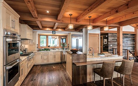 A smart open-concept timber frame kitchen layout features a balance between storage, function and style. Timberframe Kitchen, Timber Frame Home Interiors, Timber Frame Kitchen, Log Home Kitchens, Timber Home, Cabin Kitchens, Cabinet Style, Timber Frame Homes, Kitchen Farmhouse