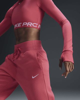 Grounded in style, comfort and versatility, meet our take on luxury loungewear. These high-waisted sweats make a statement with midweight brushed fleece in a full-length, wide-leg design. Soft yet structured, they're anything but basic. Shown: Aster Pink/Sail Style: DQ5615-629 Pink Sports Aesthetic, Nike Workout Outfits, Nike Sportswear Phoenix Fleece, Workout Clothes Nike, Sweatpants Nike, Nike Sportswear Women, Luxury Loungewear, Sports Aesthetic, Wide Leg Sweatpants