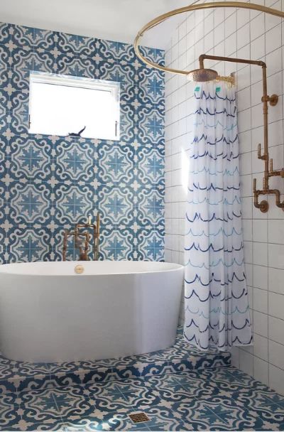 23 Vintage Tile Design Ideas - Sebring Design Build Coral Bathroom Decor, Coral Bathroom, Makeover Kamar Mandi, Mediterranean Bathroom, Shower Tiles, White Fan, Bathroom Design Trends, Bathroom Themes, Transitional Bathroom