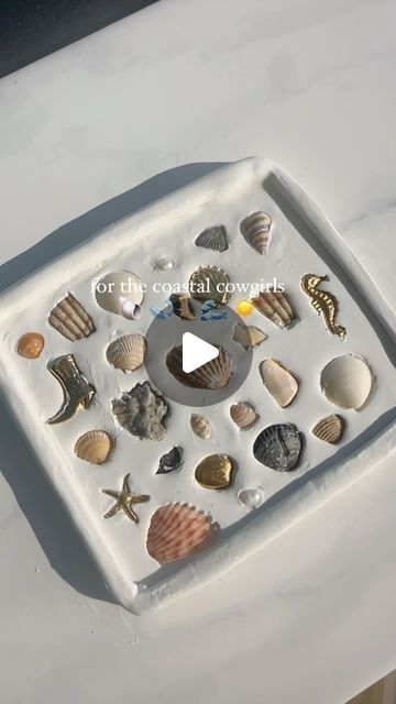 Sydney Ashlyn & Co. on Instagram: "make a coastal jewelry dish with me 🐚🌊

#coastal #summervibes #shells #shelljewelry #shellgifts #etsy #florida #coastalcowgirl #cowgirl #florida #beachvibes #cowgirlboots #pearls #pearljewelry #teengirlgifts #bachelorettegifts #bridesmaidgifts #coastbachelorette" Diy Jewelry Tray, Coastal Jewelry, Bridemaids Gifts, Bachelorette Gifts, Jewelry Tray, Shell Jewelry, Jewelry Dish, Cowgirl Boots