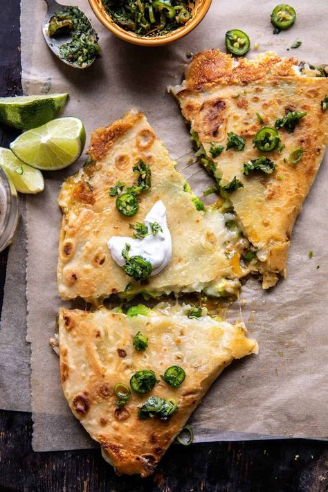 Cheese, rice, smashed avocado, and roasted poblano peppers…all tucked inside soft flour tortillas, then pan-fried until warm and crispy. These easy vegetarian quesadillas come together quickly and include simple ingredients. They’re crispy on the outside and cheesy inside. Quesadilla Recipes. Quesadilla Recipes Easy. Green Chili Recipes. Cilantro Lime Salsa, Vegetarian Gourmet, Vegetarian Quesadilla, Avocado Rice, Half Baked Harvest Recipes, Roasted Poblano Peppers, Homemade Flour Tortillas, Smashed Avocado, Harvest Recipes