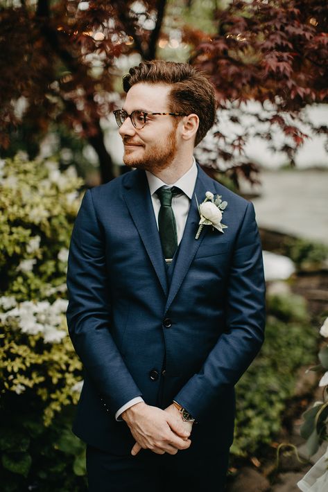 navy suit emerald green tie white ranunculus boutonniere garden outdoor wedding in Franklin Tennessee near Nashville Venue: CJs Off the Square Photographer: Janelle Elise Photo Navy Suit Dark Green Tie, Navy Suit Tie Ideas, Navy Suit Wedding Green Tie, Navy Suit Olive Green Tie, Navy And Green Suit, Navy Blue Suit With Emerald Green Tie, Dark Blue Suit Green Tie, Blue Suit Green Tie Wedding, Navy Suit With Green Tie