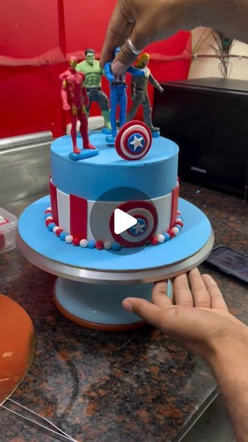 New Bits N Bites (Bakery & Cafe☕️ ) A Unique Teste on Instagram: "Avengers Theme Cake Design 🎂.  #avenger #avengers #avengerstheme #avengersthemecake #fondant #fondantcakes #fondantart #fondanticing #chirawa #jhunjhunu #bakery #chef #homebaker #bakerychef #cakeartists #cakedecoration #fondantcakedecoration #reels #instacake #viral #viralvideos #trending" Easy Superhero Cake, Super Hero Cakes For Boys, Avenger Theme Cake, Avengers Cake Ideas, Marvel Cake Ideas, Avengers Cake Design, Avengers Themed Cakes, Avengers Theme Birthday, Avengers Birthday Cake