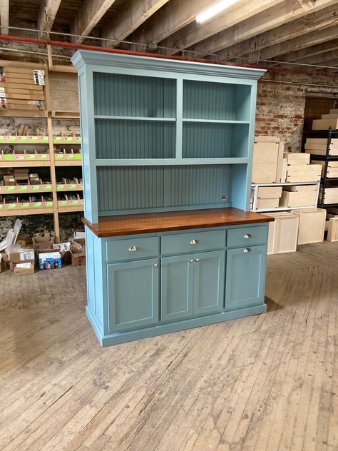 "Farmhouse hutch The base cabinet is approximately 60\" x 24\" x 34.5\" The shelf unit is 60\" x 12\" Maple top 62\" x 25\"  Overall height is approximately 84\" Ships in two pieces.  Rollouts and wastebasket pullout are optional and not included in the listed price. Top will ship unattached for ease of getting the island into your home. Instructions and screws to attach the top are included and will be in the cabinet. Our standard features are: *  Soft close doors *  Soft close under mount drawer slides.  Drawers are full extension. *  Adjustable middle shelf in cabinet (12\" deep) *  Painted one color from our color charts.  * Cabinet is sealed with a satin topcoat for added durability We use maple selected from local mills and only use domestic maple plywood for all of our panel work. W Refurbished Hutch, Farmhouse Kitchen Hutch, Coffee Bar Hutch, Bar Hutch, Roll Out Shelves, Kitchen Coffee Bar, Farmhouse Hutch, Kitchen Hutch, Coffee Bars In Kitchen