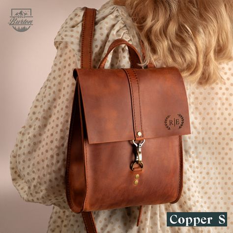 Discover the perfect blend of elegance and practicality with our Leather Backpack Purse for Women.  Whether She is exploring the city, heading to work, or embarking on a weekend getaway, our Backpack with Personalization effortlessly combines style and functionality and become a cherished companion for carrying essentials and memories. ⚜️Premium Materials: Crafted from 100% genuine leather and complemented with robust brass hardware, ensuring both durability and a luxurious feel. ⚜️Personalizati