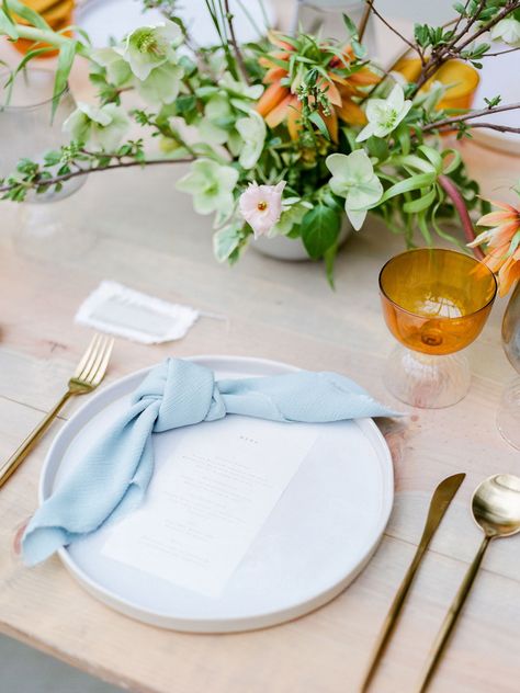 The color blue is becoming a very trendy wedding color. Click to see these blue wedding trends for your wedding planning. From blue wedding rings, to colored wedding dresses and blue bridesmaid dresses to beautiful wedding cakes. #Wedding #WeddingColors #BlueWeddingColors #Blue #BlueTrends #WeddingTrends #WeddingDetails #WeddingPlanning | Martha Stewart Weddings Orange Glassware, Something Blue Wedding Ideas, Wedding Napkin Folding, Blue Wedding Ideas, Periwinkle Flowers, White Chapel, Wedding Napkin, Blue Napkins, Blue Wedding Shoes