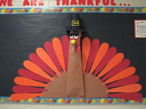 Thanksgiving bulletin board. Each feather has a sentence, "I am thankful for ______." Child writes in word (or tries with help), discussion follows of course.: Preschool Thanksgiving Bulletin Boards, Thanksgiving Preschool Bulletin Boards, Thanksgiving Bulletin Boards For School, Turkey Bulletin Boards, Thanksgiving Boards, Thanksgiving Bulletin Board Ideas, Cafeteria Bulletin Boards, Thanksgiving Bulletin Board, Thanksgiving Board