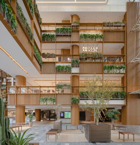 AIM Architecture turns Xintiandi shopping mall atrium into plant-filled plaza Atrium Design, Shopping Mall Design, Outdoor Paving, Mall Design, Renovation Design, Shopping Malls, Modern City, Architecture Photo, Architecture Project