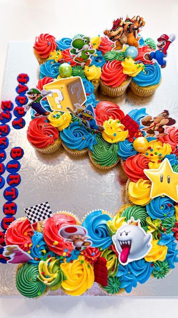 👑 on Instagram: "pull apart cupcakes are always a good idea! So fun and festive 🎉 have you seen the new @supermariomovie movie? • #supermariomovie #mariokart #mariokartcupcakes #pullapartcupcakes #birthdaycake #cake #cakedecorating" Mario Cake And Cupcakes, Super Mario Party Cake, Super Mario Cupcake Ideas, Mario Party Cupcakes, Super Mario Theme Cupcakes, Mario Bros Cupcake Cake, Mario Theme Cupcakes, Super Mario Birthday Cupcakes, Mario Bros Cupcakes Ideas