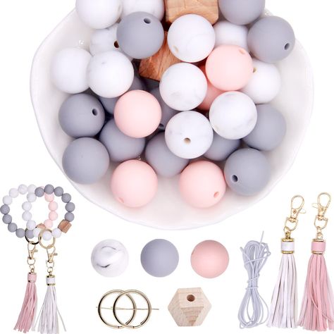 PRICES MAY VARY. 【Valentine's Day Silicone Beads】These pink and white silicone beads, gray and white silicone beads 15mm are made of food grade silicon beads, safe silicone material rubber beads for keychains. 【Silicone Beads Bulk】The package contains totally 35PCS rubber beads 15mm, including 28PCS 15mm silicone beads, 2PCS wooden hexagon bead, 2PSC PU leather keychain tassels, 1PCS 2m elastic cord, 2PCS key rings. 【Silicone Beads for Keychain Making】These 15mm silicone beads bulk might be the Rings Silicone, Silicon Beads, Silicone Bead Wristlet, Christmas Keychain, Classy Rooms, Rubber Bead, Keychain Making, Keychain Display, Beadable Products