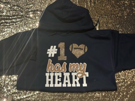 #1 has my heart 🖤🫶🏾Custom Football Hoodie! 🏈 DM or TEXT (313)318-0114 to place an order📲| #jaicreativecollection🎀 #footballseason #basketball #basketballseason #custombasketball #custombasketballhoodie #basketballgirlfriend #detroitsmallbusiness #customhoodie #customphotohoodie #proudbasketballgirlfriend #supportdetroitblackbusinesses #southfieldbusiness #smalldetroitbusinesses #proudgirlfriend Football Shirts For Best Friends, Basketball Girlfriend Hoodies, Custom Basketball Shirts Girlfriend, Basketball Hoodies For Girlfriends, Girlfriend Basketball Shirts Ideas, Basketball Girlfriend Shirts Ideas, Basketball Shirts For Girlfriends, Basketball Girlfriend Shirts, Basketball Gf Shirts