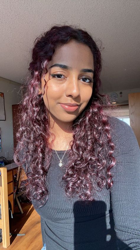 3b Red Curly Hair, Dark Purple On Curly Hair, Red Wine Hair Color Dark Curly, Deep Red Hair Color Curly, Curly Hair Dye Ideas Brown Skin, Plum Red Curly Hair, Burgundy Hair On Curly Hair, Dark Chocolate Burgundy Hair, Red Cherry Hair Curly