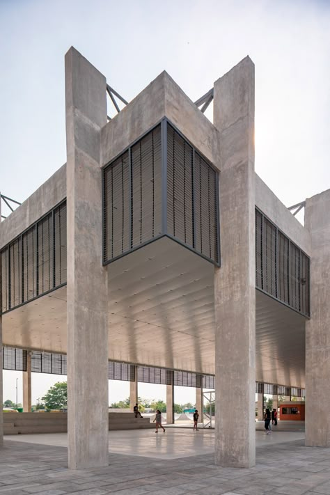 Quintanilla Arquitectos designed the structure with concrete posts and steel trusses. Concrete Building Architecture, Mexican Town, Truss Structure, Steel Architecture, Concrete Posts, Brutalism Architecture, Concrete Architecture, Concrete Building, Architecture Concept Drawings