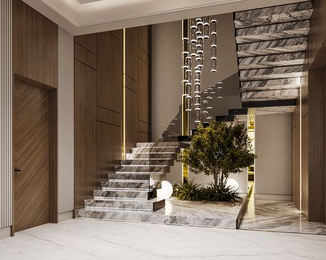 Loby Home Interiors, Small Garden Under Stairs, Space Under The Stairs, Dracaena Sanderiana, Luxury Stairs, درج السلم, Luxury Staircase, Staircase Design Modern, Glamorous Interiors