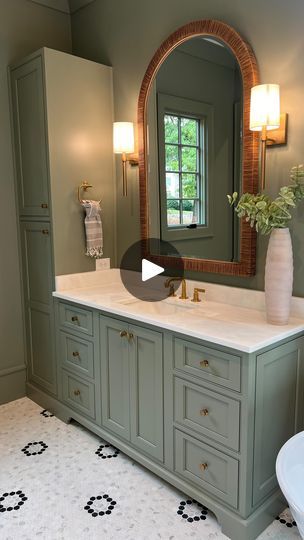 2.1K views · 271 reactions | When I landed on the color for the custom bath vanity cabinets, I knew immediately I wanted to color drench the walls and trim in the same tone! 

Absolutely love how this master bath came together! | Curated Home Single Vanity Master Bath, Bathroom Linen Closet, Vanity Cabinets, Curated Home, Master Bath Remodel, Bath Cabinets, Green Cabinets, Bath Remodel, Vanity Cabinet