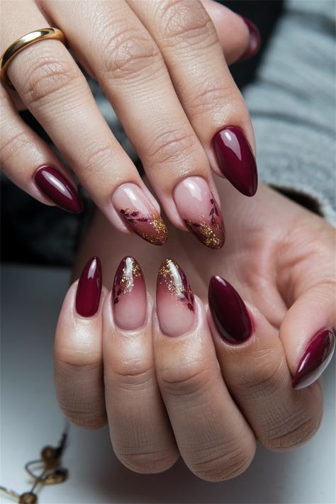 Embrace the beauty of autumn with these elegant acrylic fall nail ideas that blend warm oranges, deep reds, and soft browns. Perfect for capturing the essence of the season, this stunning nail art features intricate leaf designs and subtle shimmer, reflecting the colorful foliage outside. Transform your nails into a canvas of fall beauty, making every gesture an expression of seasonal style. Don’t miss out on these enchanting designs! Black And Red Fall Nails, Nail Ideas Red And Gold, Autumnal Nail Designs, Red Fall Nails Ideas, Fall Nail Designs Red, Fall Red Nails Designs, Maroon Wedding Nails, Winter Season Nails, Red Burgundy Nails