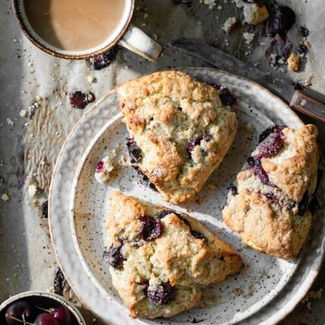 Homemade Cherry Scones Recipe is the perfect breakfast treat for cherry season. Large easy scones flavored with fresh cherries, orange, vanilla, and almond. #cherryscones #cherryrecipes #sconesrecipe #cherrysconesrecipe #twocupsflour Cherry Scones Recipe, Berry Scones, Cherry Scones, Blueberry Biscuits, How To Make Scones, Chocolate Blueberry, Chocolate Scones, Blueberry Scones, Scones Recipe