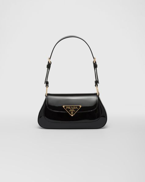 Black Patent leather shoulder bag | PRADA Prada Classic Bag, Luxury Black Patent Leather Shoulder Bag, Prada Arqué Leather Shoulder Bag, Prada Bag Black, Vintage Prada Shoulder Bag, Shoulder Bag Prada, Bag Prada, The Triangle, Curved Lines