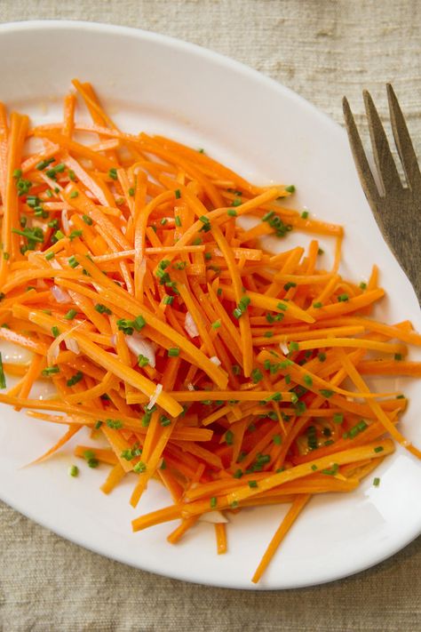 NYT Cooking: Sometimes a classic, masterfully executed salad is just what you want, and the easier the better. Enter this simple French salad, also known as called carottes râpées. It is grated carrots dressed with a simple vinaigrette Salad Sauce Dressing, Best Homemade Salad, Julienne Carrots, Salad Dressing Healthy, Lunches Recipes, Persimmon Salad, Fuyu Persimmon, Grated Carrot Salad, Nyt Recipes