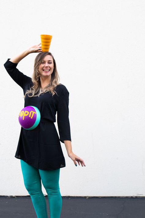 DIY Bop It! Costume // Recreate the classic 90s toy Bop It! with a few simple supplies! This easy 90s toy costume is the perfect nostalgic costume for adults! #costume #halloween #90s #toycostume #adultcostume #halloweencostume #diycostume Funny Pregnant Halloween Costumes, Beanie Baby Costumes, It Costume, Toy Costume, Bop It, Paper Doll Costume, Quick Halloween Costumes, Lego Costume, Quick Costumes