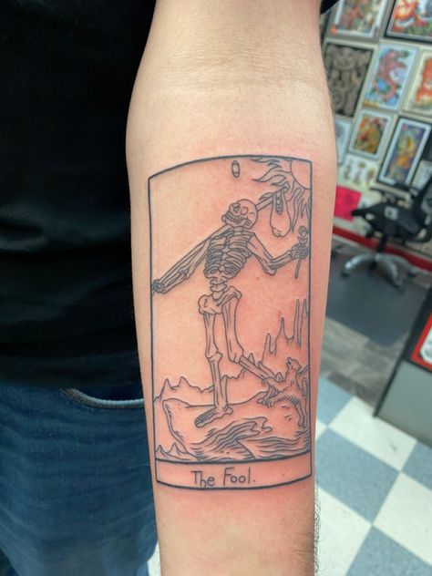 The Fool Tarot Card Tattoo done in black linework with no shading on the forearm Fool Tarot Card Tattoo, Tattoo Tarot Card, Bailey Illustration, The Fool Tarot Card, Fool Tarot Card, Deep Tattoo, The Fool Tarot, Left Arm Tattoos, Tarot Card Tattoo