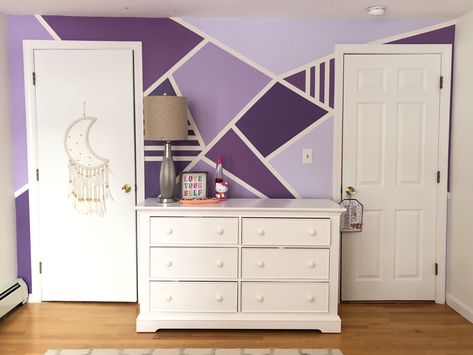 Accent Wall Purple Bedroom, Purple Accent Wall Bedroom Kids, Geometric Wall Paint Purple, Purple Wall Room Ideas, Purple Geometric Wall, Accent Wall Purple, Purple Girls Room Paint, Purple Feature Wall, Girls Bedroom Purple