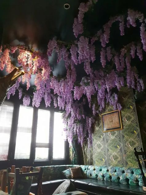 Flowers Hanging From Ceiling Living Room, Whimsigothic Bathroom Ideas, Artificial Flower Ceiling, Hanging Celling Decoration Diy, Fairy Ceiling Decor, Wisteria On Ceiling Bedroom, Artificial Wisteria Decor, Purple Flowers Hanging From Ceiling, Wisteria Indoors