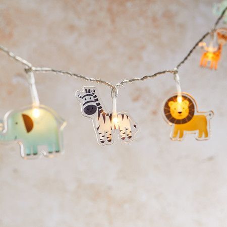 Transform your little one’s room into the ultimate safari experience with our themed string lights! These 1.65m of lights feature 12 acrylic animals of four different characters, each brought to life with a warm white LED. Nursery String Lights, Acrylic Animals, Safari Bedroom, Bedroom Styling, Indoor Kids, Shower Stuff, Theme Nursery, Boys Nursery, Indoor String Lights