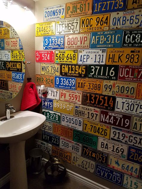 License Plate Ceiling, Mechanic Shop Bathroom Ideas, Car Theme Bathroom, Race Car Bathroom Ideas, Car Themed Bathroom, License Plate Display Ideas, Mechanic Bathroom, License Plate Decor, License Plate Wall