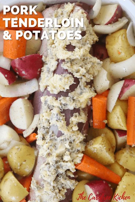 This oven baked Pork Tenderloin and Potatoes is tender and juicy, packed full of flavor and oh-so-easy. Simply slather in a delicious herb butter alongside potatoes, carrots and onions and let the oven do the work. #thecarefreekitchen #pork #porktenderloin #simple #dinnerideas #ovenbaked Pork Loin Potatoes Carrots Oven, Pork Tenderloin Pot Roast, Oven Tenderloin Pork Loin, Slow Roast Pork Tenderloin Oven, Baked Pork Tenderloin With Potatoes, Pork Tenderloin Recipes In Oven With Potatoes And Carrots, Pork Roast Potatoes And Carrots In Oven, Pork Roast And Potatoes In Oven, Easy Pork Tenderloin Recipes Oven