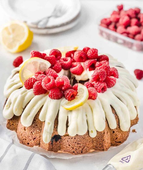 Nothing Bundt Cake Copycat Recipes, Raspberry Lemon Cake, White Raspberry Bundt Cake, Lemon Raspberry Bundt Cake Recipe, Lemon Raspberry Bundt Cake, Lemon Raspberry Cake, Bundt Cake Cream Cheese Frosting, Lemon Cake With Raspberries, Nothing Bundt Cakes Recipe Copycat Lemon Raspberry