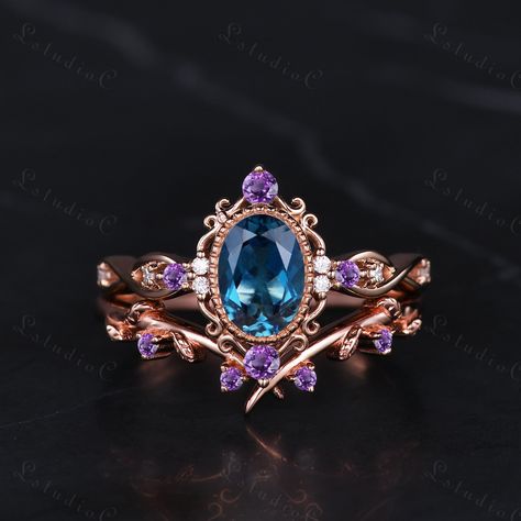 5x7mm Art Deco Oval London Blue Topaz Bridal Ring Set Vintage Amethyst Leaf Engagement Ring Antique Women Promise Anniversary Ring Unique Gift Side stones: amethyst and moissanite This ring can also be made in genuine solid 10k, 14k, 18k gold or Platinum, and all the rings in my shop can be customized too! If you want to know more details about the ring, just contact with me anytime! If you want to customize the ring, just contact with me anytime! If you want to make a custom jewelry, just conta Tiara Ring Engagement, Amethyst Ring Vintage, Tiaras Jewellery, Leaf Engagement Ring, Cute Engagement Rings, Future Engagement Rings, London Blue Topaz Ring, Magical Jewelry, Bridal Ring Set