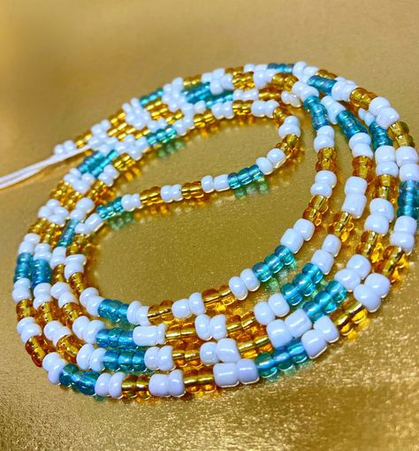 Golden Ocean belly beads/ weight loss tracker waist chains/ African #waistbeads/ tummy waistlet/ cute multi color waist beads #starscelestial #beautywaists Belly Beads, Kwanzaa Gifts, African Waist Beads, African Artwork, Goddaughter Gifts, Tiger Eye Crystal, Waist Beads, Healing Crystal Jewelry, Granddaughter Gift