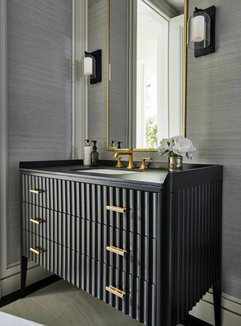 How to Design a Dark and Moody Powder Room - Gluckstein Home | Gluckstein Elements Powder Room Dramatic, Black And Gold Powder Room, Black Powder Room Ideas, Luxury Powder Room Design, Moody Powder Room, Wallpaper Powder Room, Bathroom Design Styles, Black Counters, Black Vanity