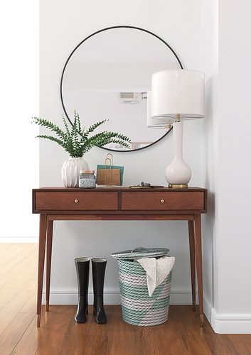 Add sophisticated storage to your living room or entryway with this mid century modern console table. This piece has two drawers of storage available and there is ample space on the tabletop for the display of room accent pieces including framed photographs. Designed in the mid century modern style with tapered wood legs capped with brass metal. This table is made using walnut brown wood veneer and features an etched chevron pattern on the drawer fronts. Atl Apartment, Mid Century Console Table, Mid Century Modern Console Table, Mid Century Entryway, Meja Nakas, Drawer Decor, Mid Century Console, Apartment Designs, Modern Console Table