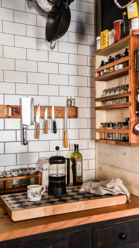 In this photo: Mess Hall Knife Rack, Apothecary Cabinet, Bishop Board, and Apothecary Caddy. Click through to view them on our website. #interior #kitchen Kitchen Knife Display, Home Chef Kitchen, Kitchen Apothecary, Apothecary Kitchen, Knife Photography, Mess Hall, Kitchen Loft, Witchy Kitchen, Loft Kitchen